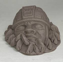 Olmec Head and ferns